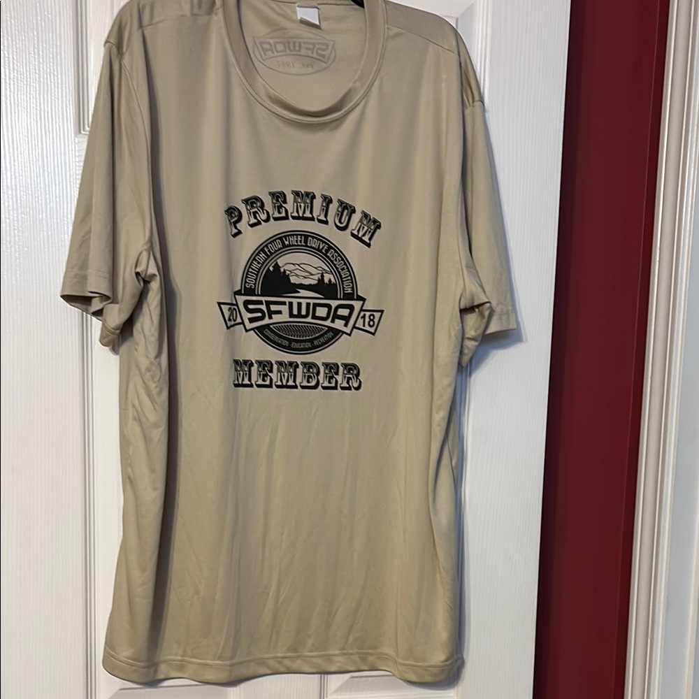Nwot SFWDA Premium Member tanish gold short sleeve T-Shirt 100% polyester